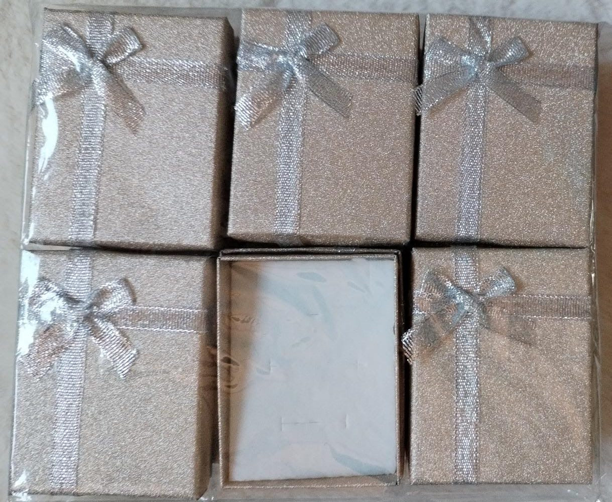 Docena de cajas champan con brillo y moño 7*9
