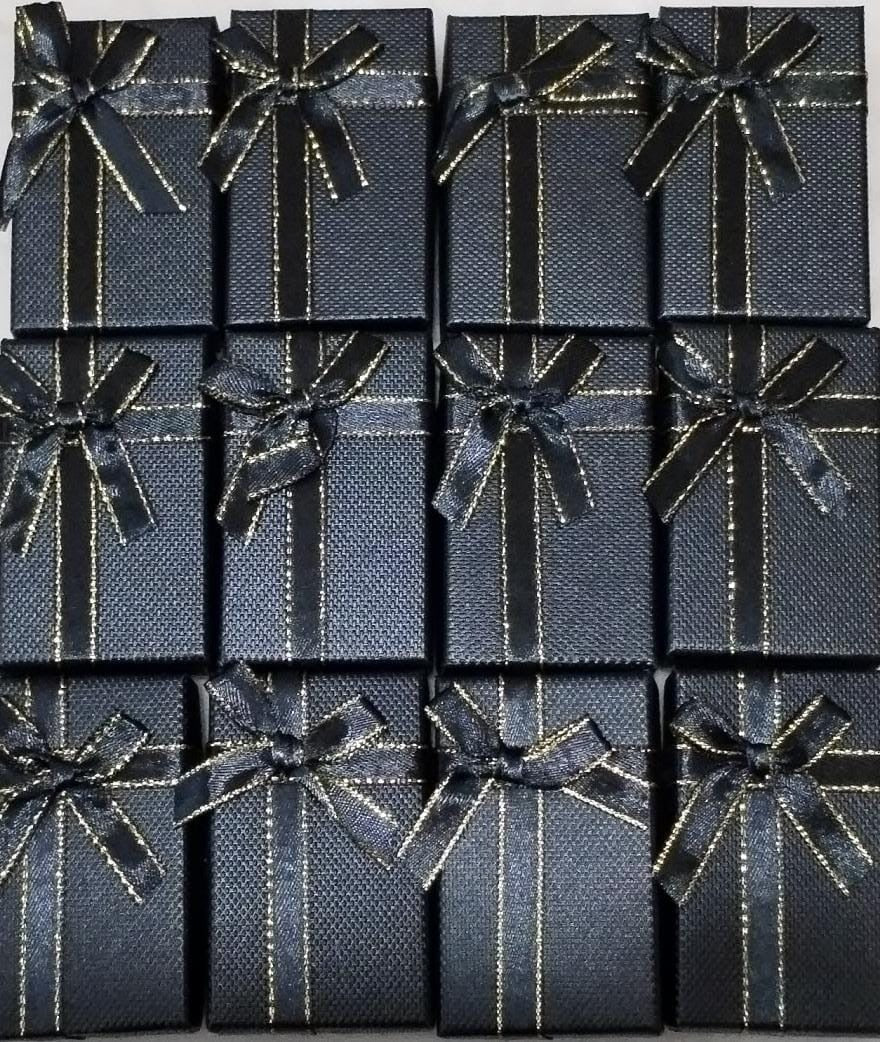 Docena de cajas color negro con moños